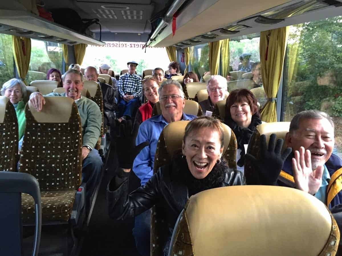 Smiling passengers on the motor coach in Germany,