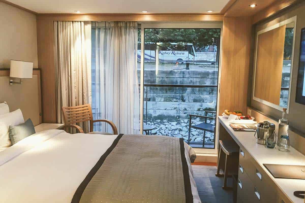 Viking Skadi cabin 311 with bed, and sliding doors to balcony.