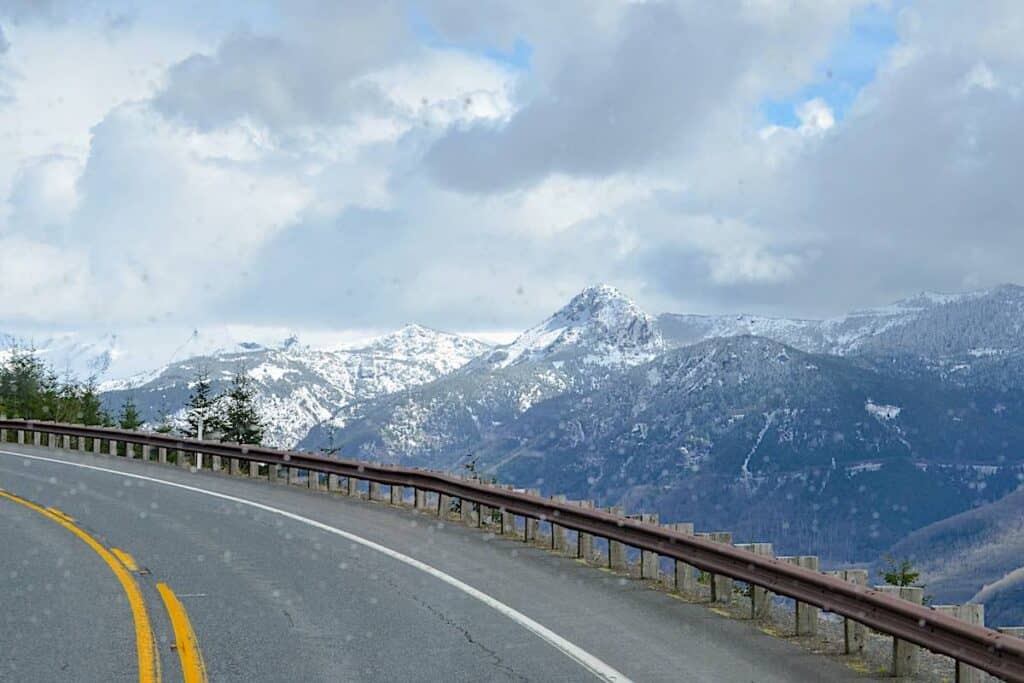 Taking a curve on the snowy road up to Mount St. Helens