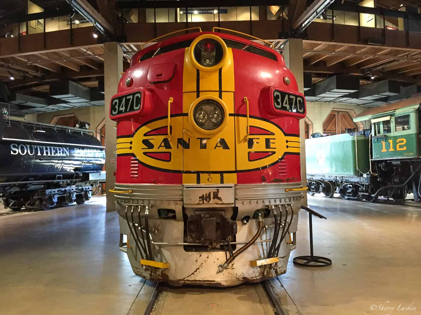Old red and yellow Santa Fe train engine.